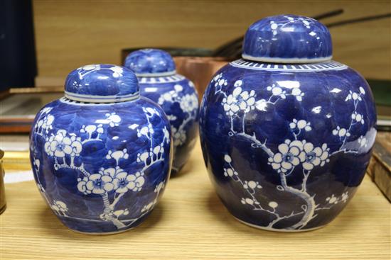 A Chinese ginger jar and cover and a similar matching pair (3)